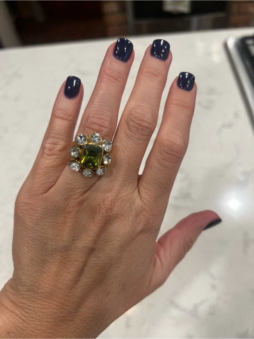 Gold Cocktail Ring with Olive Green Center and Clear Accents